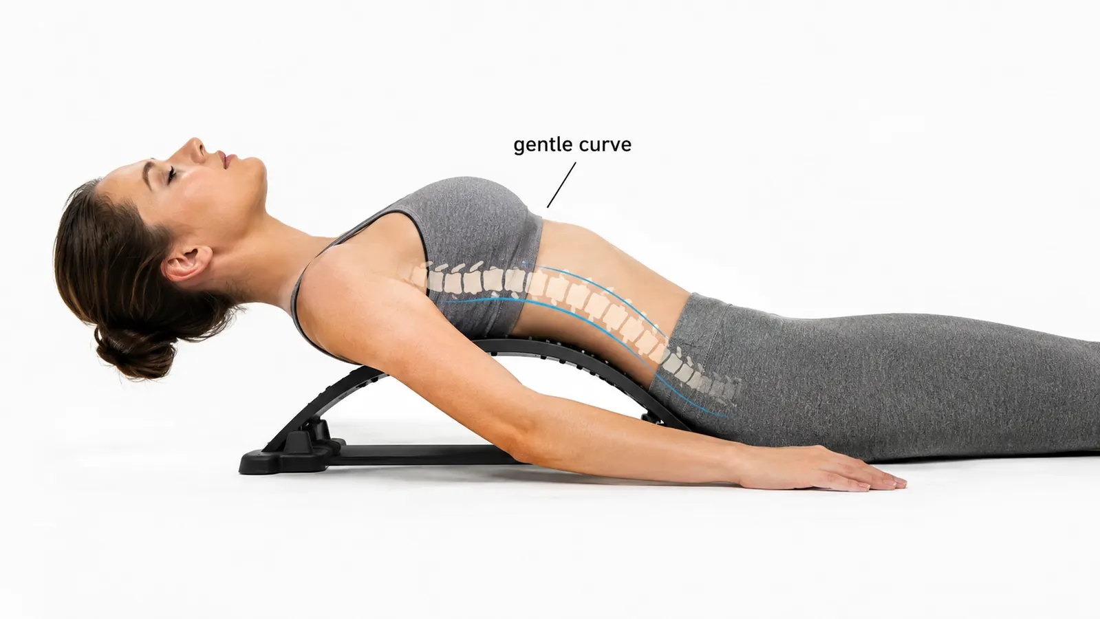 A simple line drawing of a person lying back over a back stretcher, with a label showing the spine in a gentle curve